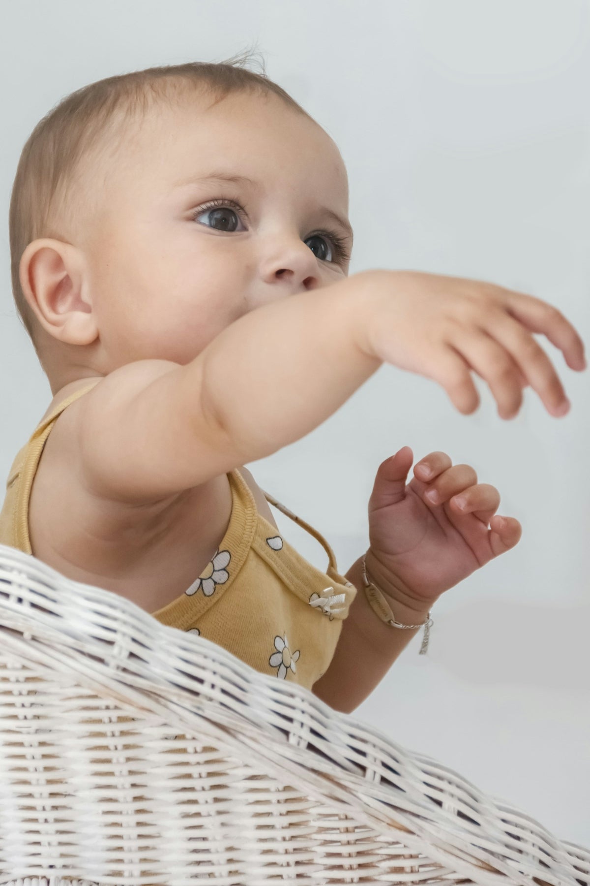 a baby with a white dress